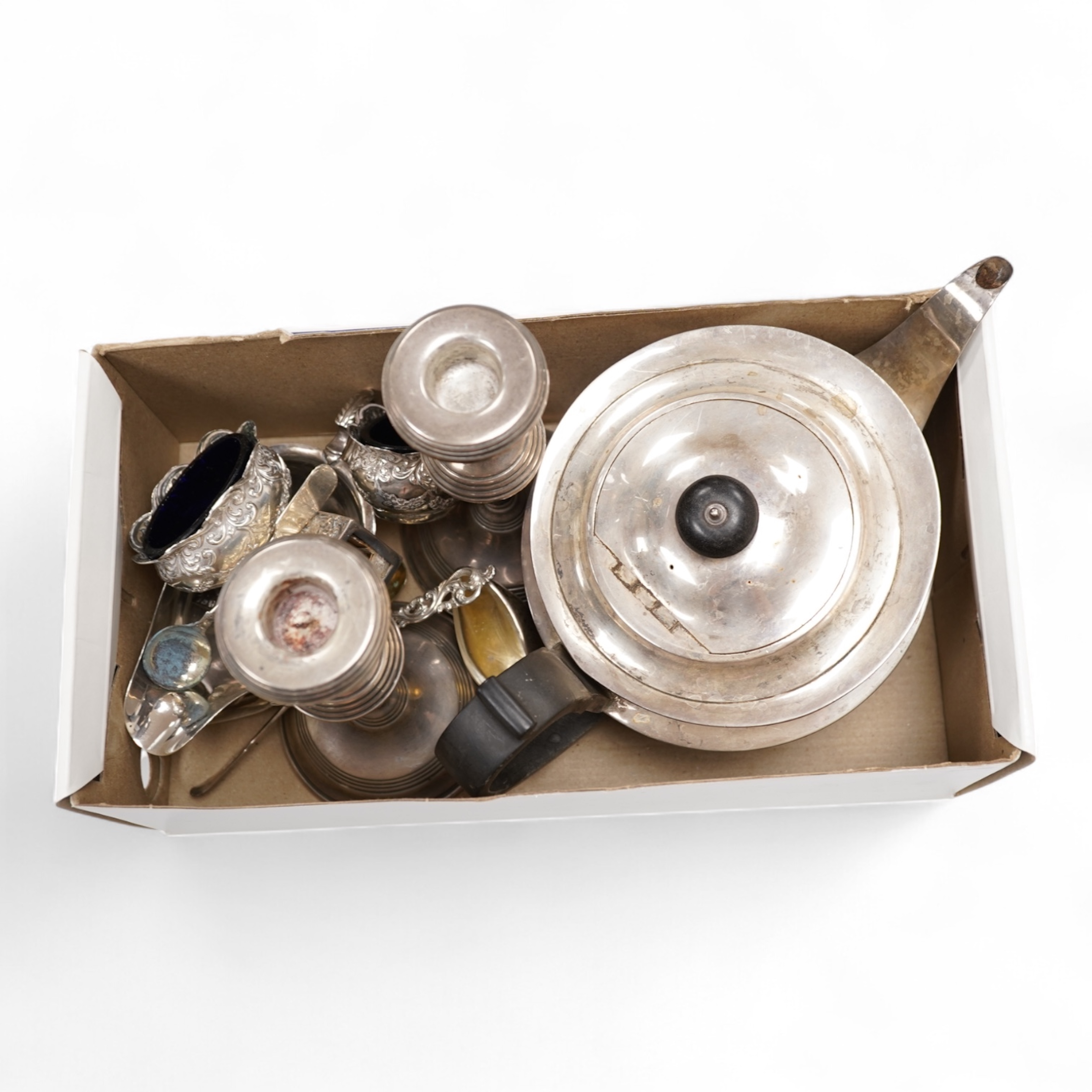 Assorted silver including a George V silver teapot by James Dixon & Sons, Sheffield, 1925, gross weight 25.6oz, an Edwardian silver sauceboat, a near pair of modern silver candlesticks, a silver matchbox holder, a pair o